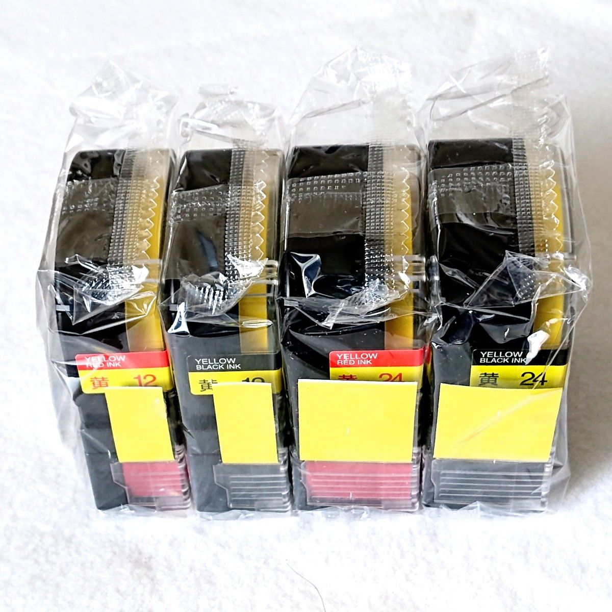テプラテープ キングジム テプラPRO 純正品 12㎜と24㎜のパステル黄色【赤文字】と【黒文字】の4個【P・Rの両機種に対応】