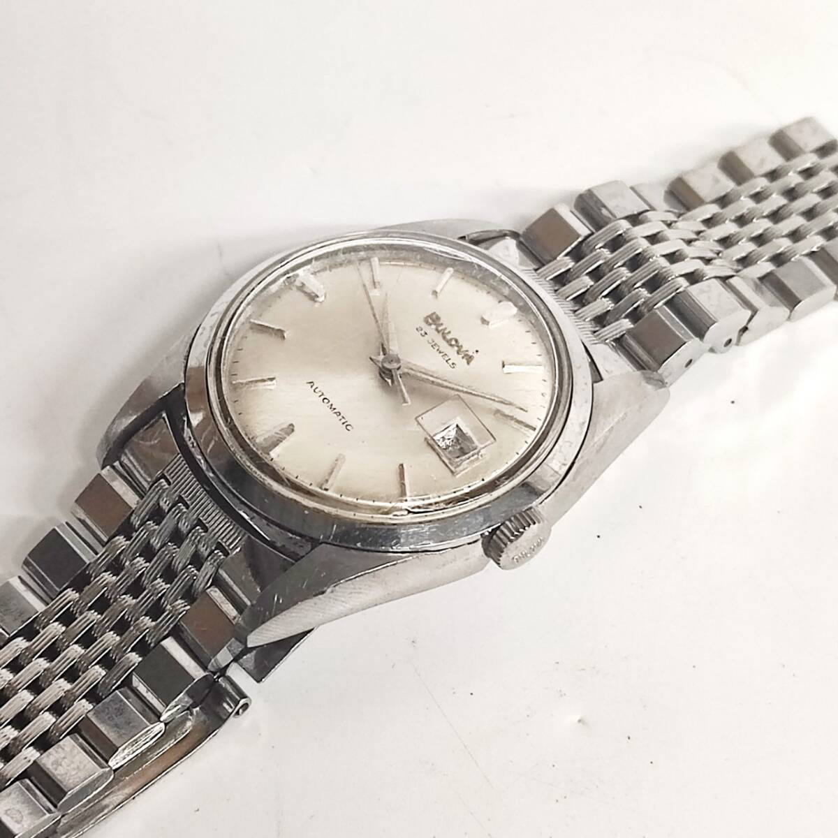 1円~【実動】ブローバ BULOVA Ref.394-3 自動巻き メンズ腕時計 シルバー文字盤 ラウンドフェイス デイト 純正ベルト 3針 23石 G123071の画像2