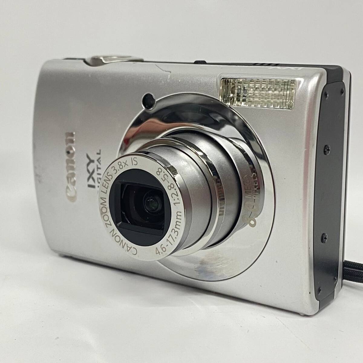 1円~【ジャンク品】キャノン Canon IXY DIGITAL 910 IS PC1249 ZOOM LENS 3.8×IS 4.6-17.3mm 1:2.8-5.8 コンパクトデジタルカメラ G115899_画像1