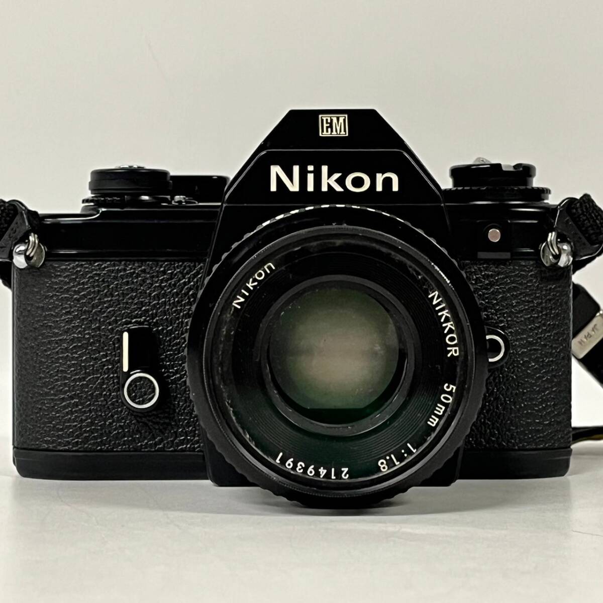1円~【動作未確認】ニコン Nikon EM NIKKOR 50mm 1:1.8 一眼レフ フィルムカメラ 単焦点レンズ 標準レンズ 付属品あり G180515_画像2