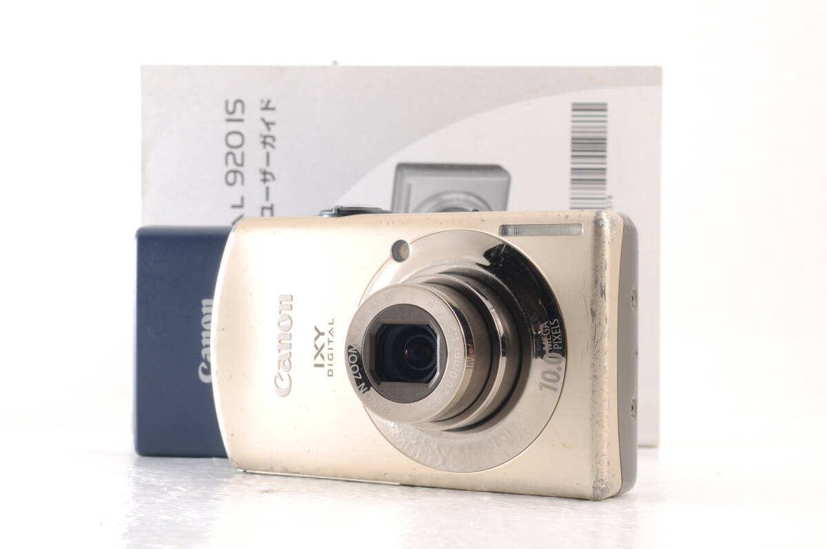 動作品 キャノン Canon IXY DIGITAL 920 IS ゴールド コンパクトデジタルカメラ 取説 充電器付 管GG2934_画像1