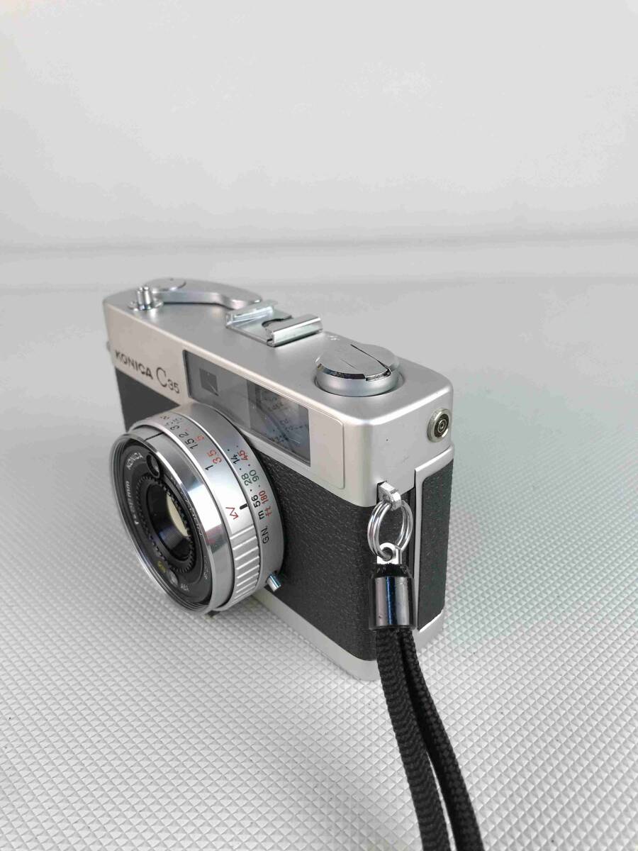 A10514◇KONICA コニカ コンパクトカメラ フィルムカメラ C35 f=38mm HEXANON 1:2.8 ケース付【未確認】240422の画像2