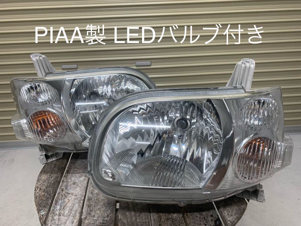 レンズリペア品　L375S L385S　タント 　 KOITO 100-51945 　左右ヘッドライト　PIAA製LEDバルブ付き電動レベライザー付_画像1