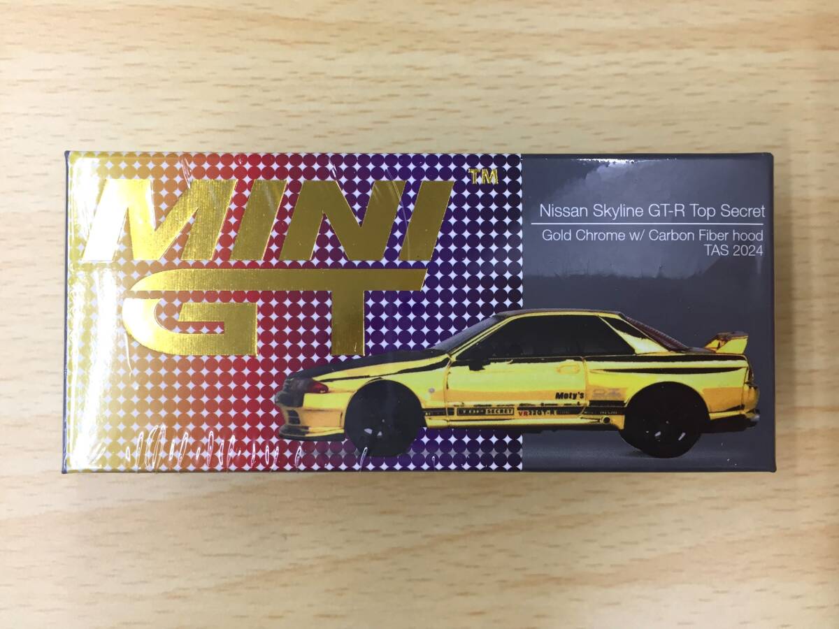 119 C-833/未開封 MINI GT 1/64スケール ミニカー Nissan Skyline GT-R Top Secret VR32 Gold Chrome w/ Carbon Fiber hood TAS 2024の画像1