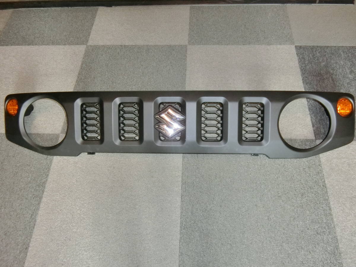 SUZUKI JIMNY JB64W original front grille new car taking non-original goods almost unused goods.*****