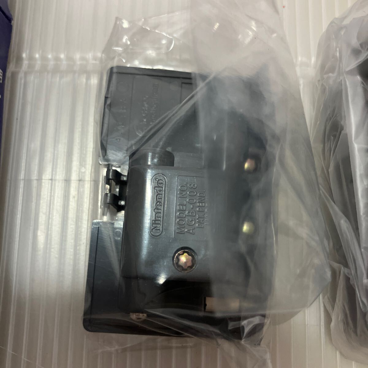 [ unused moreover, unused . close ] Game Boy Advance exclusive use AC adaptor set AGB-009