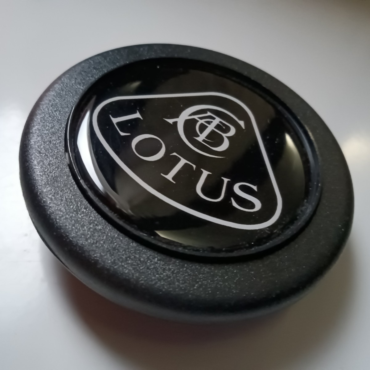 LOTUS horn button black 