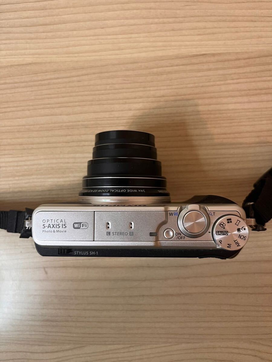 *OLYMPUS digital camera STYLUS SH-1 silver optics type 5 axis blurring correction optics 24 times & super . image 48 times zoom SH-1 SLV working properly goods battery attaching beautiful goods 