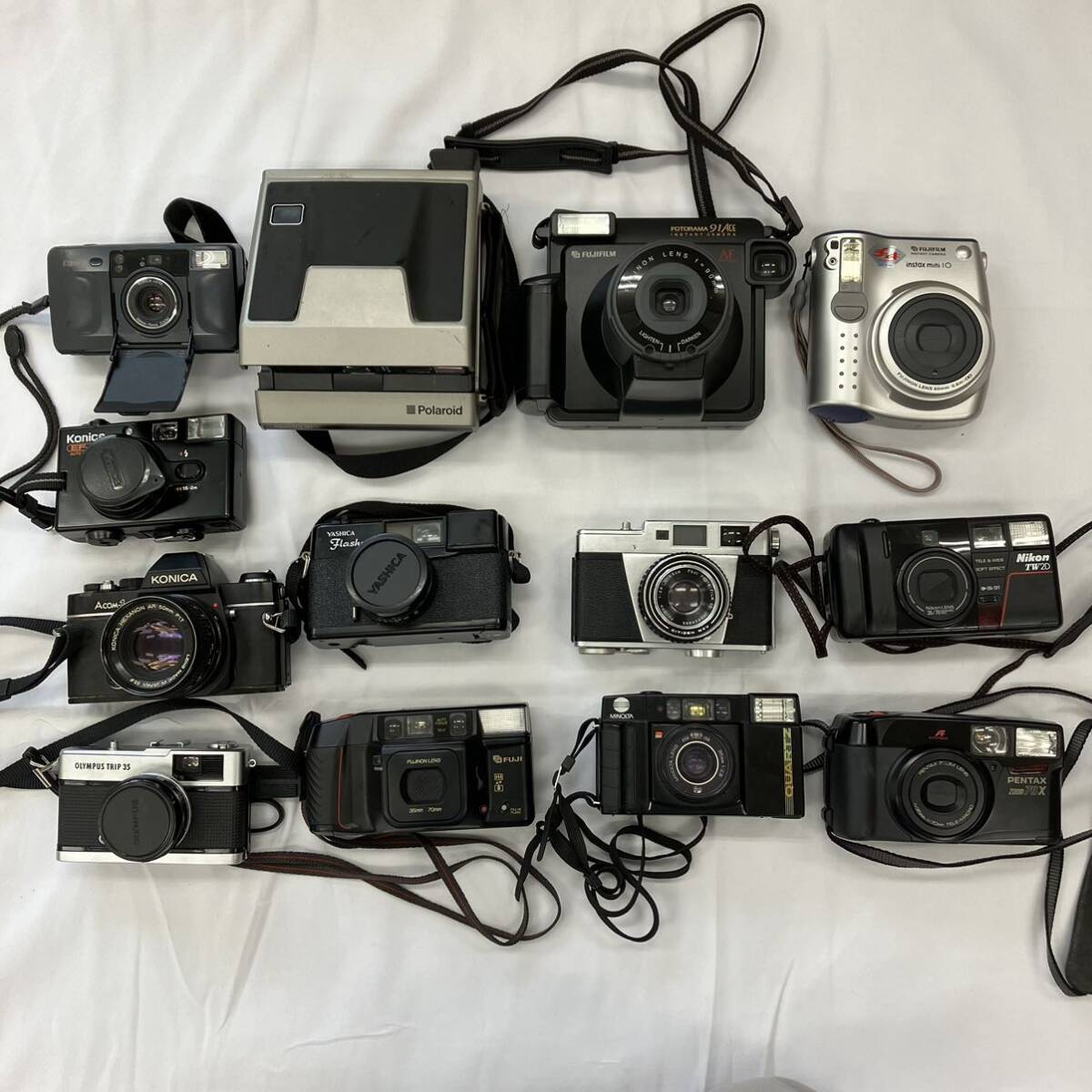 【ジャンク品】カメラ まとめ売り 計13個 一眼レフ Canon polaroid FGIFILM Konika olypus yashica pentaxの画像1