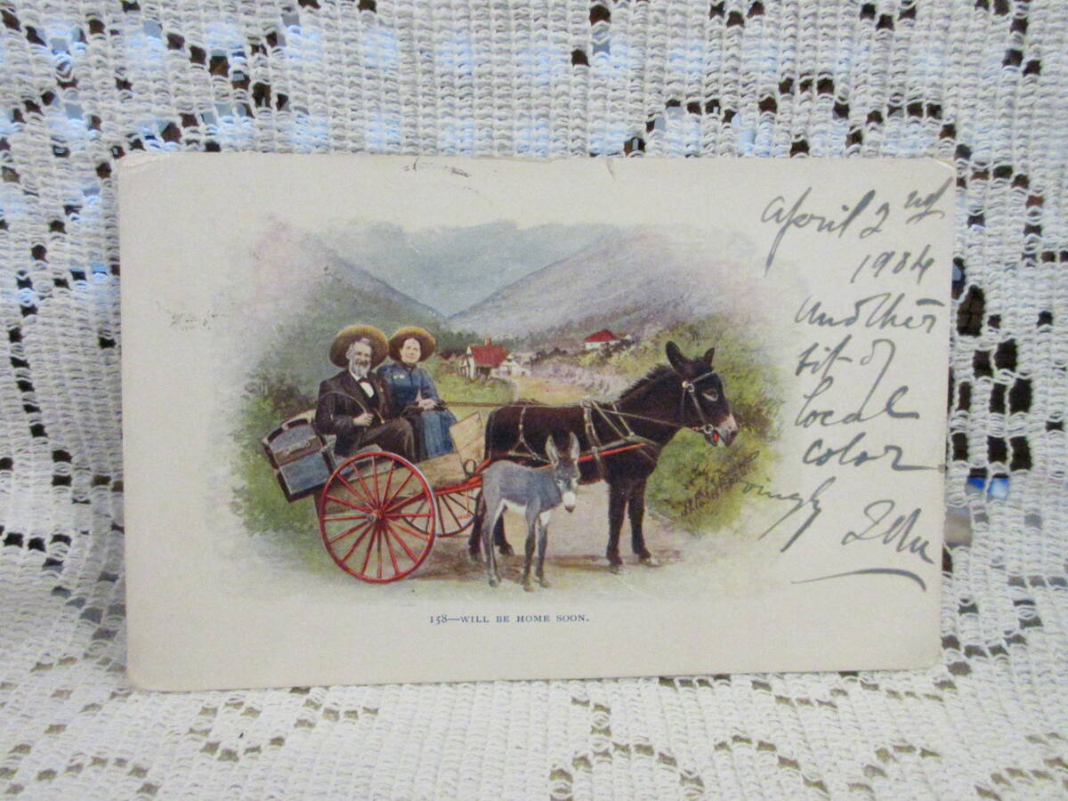 アンティーク 絵葉書 ポストカード エンボス ロバの親子 人物 車 家 山 間もなく帰宅 サイン アメリカ切手1904年の画像1