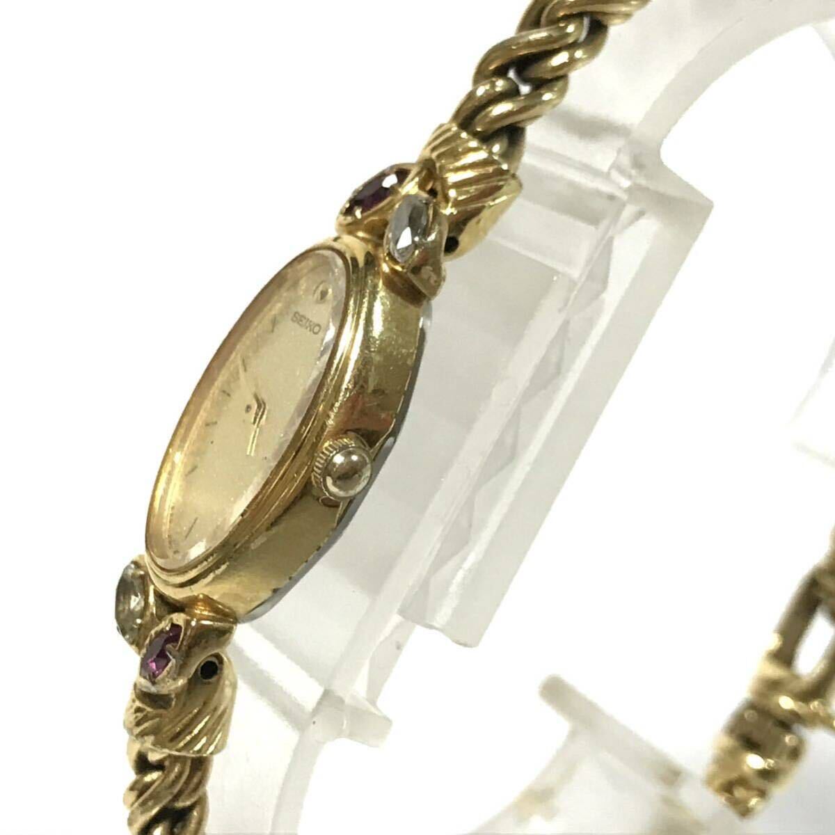 SEIKO セイコー 1E20-5760 動作品 クォーツ ゴールド 石付き オーバル 2針 レディース 腕時計