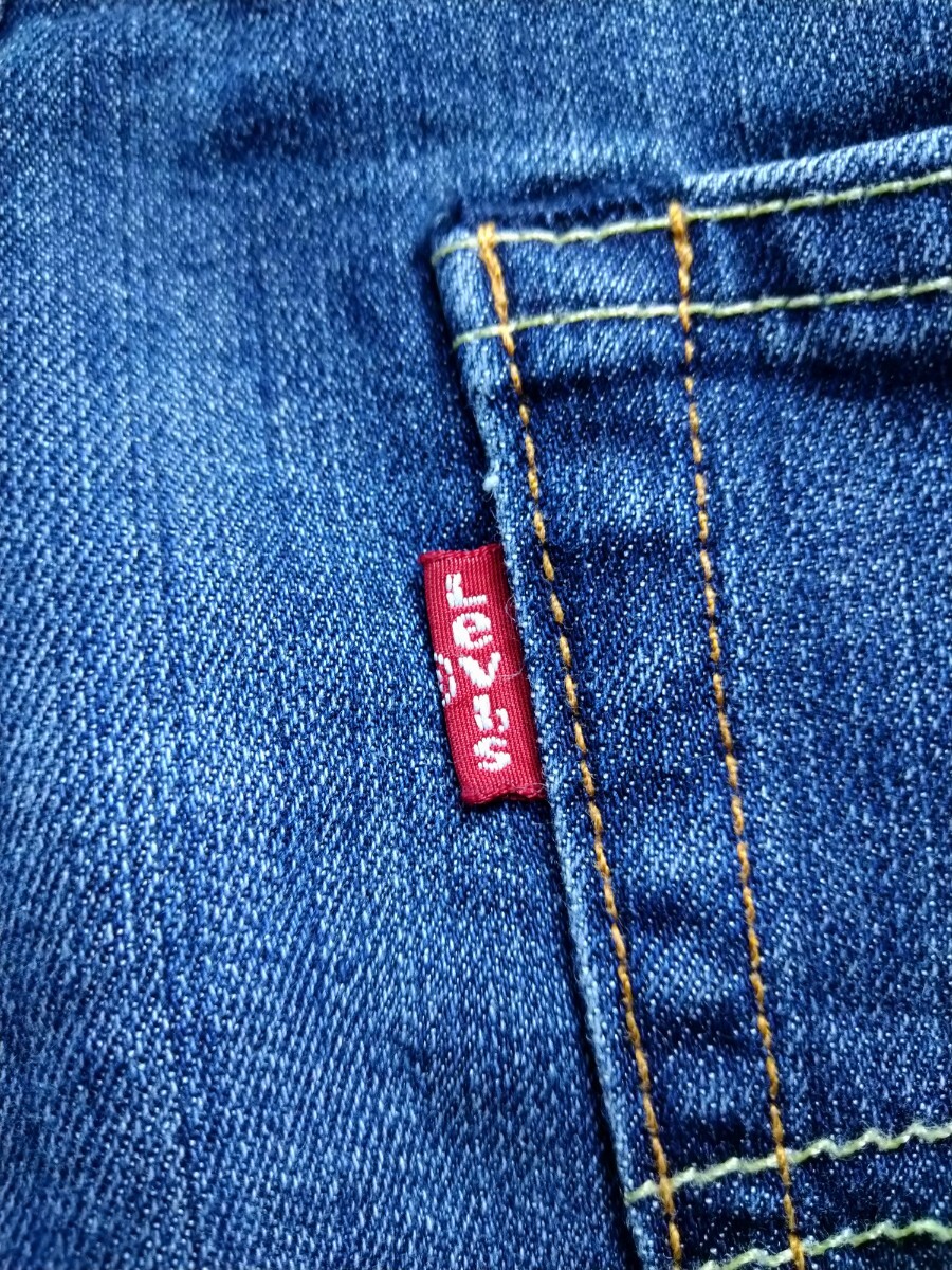 送料込★Levi's502/ストレッチソフトデニムハーフジーンズ/30表示~w身体77/中インディゴ軽い縦落ち/5ポケ/パルプパッチ/赤タブe/15.07月製