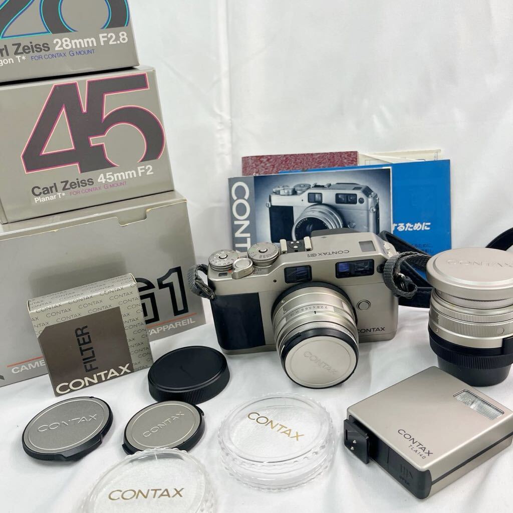 ③ CONTAX G1 コンタックス フィルムカメラ レンズ2個付き 付属品あり箱あり説明書ありの画像1