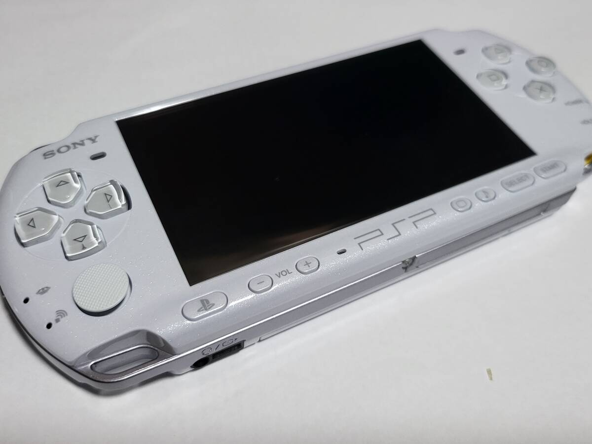 動作OK PSP-3000 白 キュル音大 ヤケ大 6.61 送料185円 or 370円 or 520円の画像1