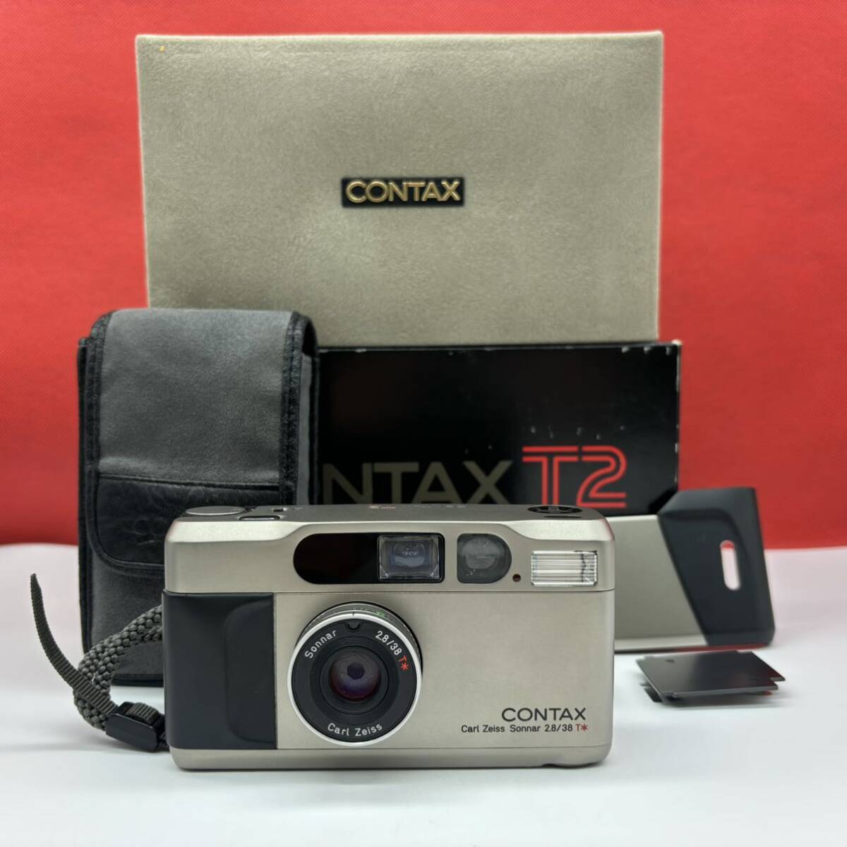 ◆ CONTAX T2 フィルムカメラ コンパクトカメラ Carl Zeiss Sonnar 2.8/38 T* シャッター、フラッシュOK ケース付 コンタックスの画像1