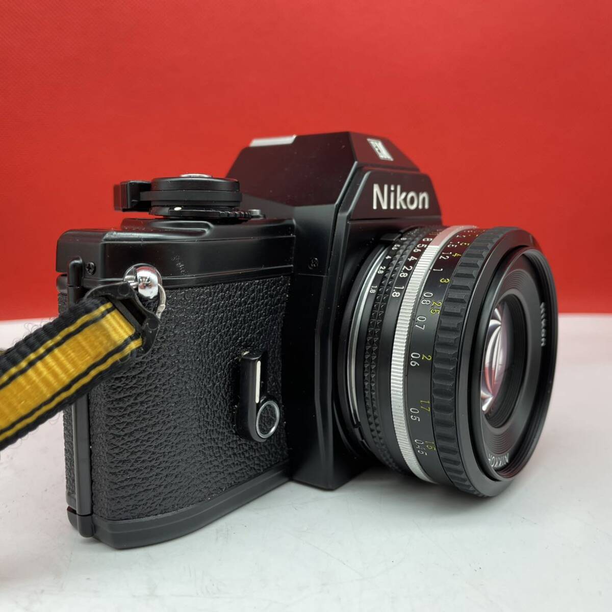 □ Nikon EM 一眼レフカメラ フィルムカメラ ボディ ブラック NIKKOR 50mm F1.8 Ai-s レンズ シャッター、露出計OK ニコンの画像2