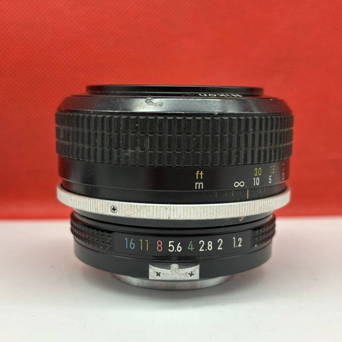 * Nikon NIKKOR 55mm F1.2 camera lens manual focus single burnt point Nikon 