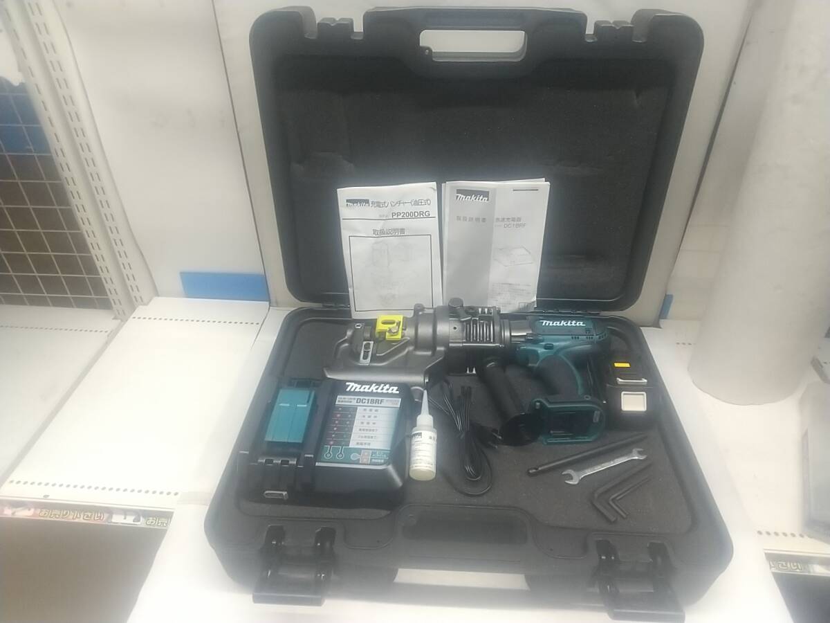 【中古品】★makita(マキタ) 18v充電式パンチャ [携帯油圧式] (6.0Ahバッテリx1/充電器/ケース) PP200DRG　IT91OCUYPPG6_画像1