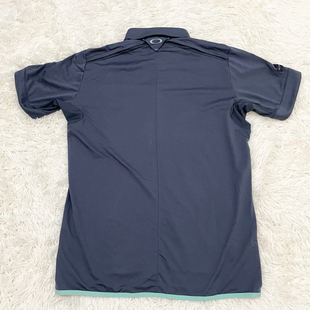 OAKLEY [ прекрасный товар ] рубашка-поло с коротким рукавом темно-синий XL размер Oacley Skull череп golf Golf одежда многофункциональный двойной Zip мужской 