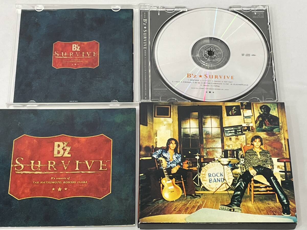 B'z ＣＤ　アルバム　「SURVIVE」　12曲収録　三方背ケース仕様　フォトブックレット付き 稲葉浩志　松本孝弘　1.DEEP KISS 2.スイマーよ_画像2