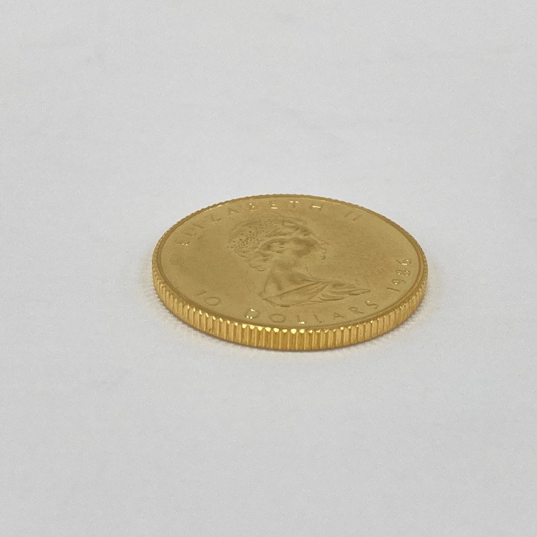 K24IG Canada Maple leaf gold coin 1/4oz 1986 gross weight 7.7g[CEAM9036]