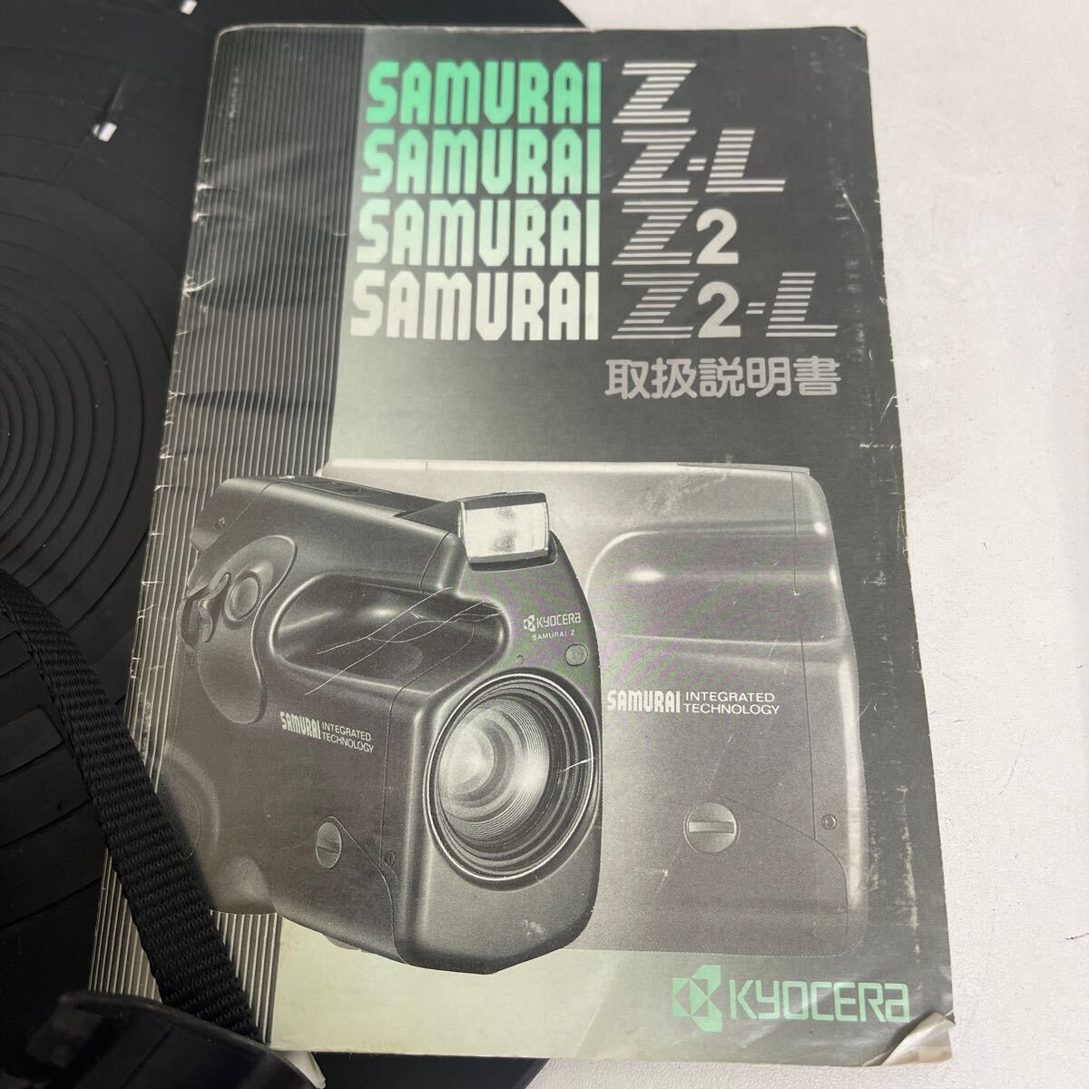 Y507. 10. kyocera Kyocera SAMURAI Z2 f=25.-75.1:4.0-5.6 compact film camera operation is unconfirmed. goods present condition delivery original box instructions attaching 