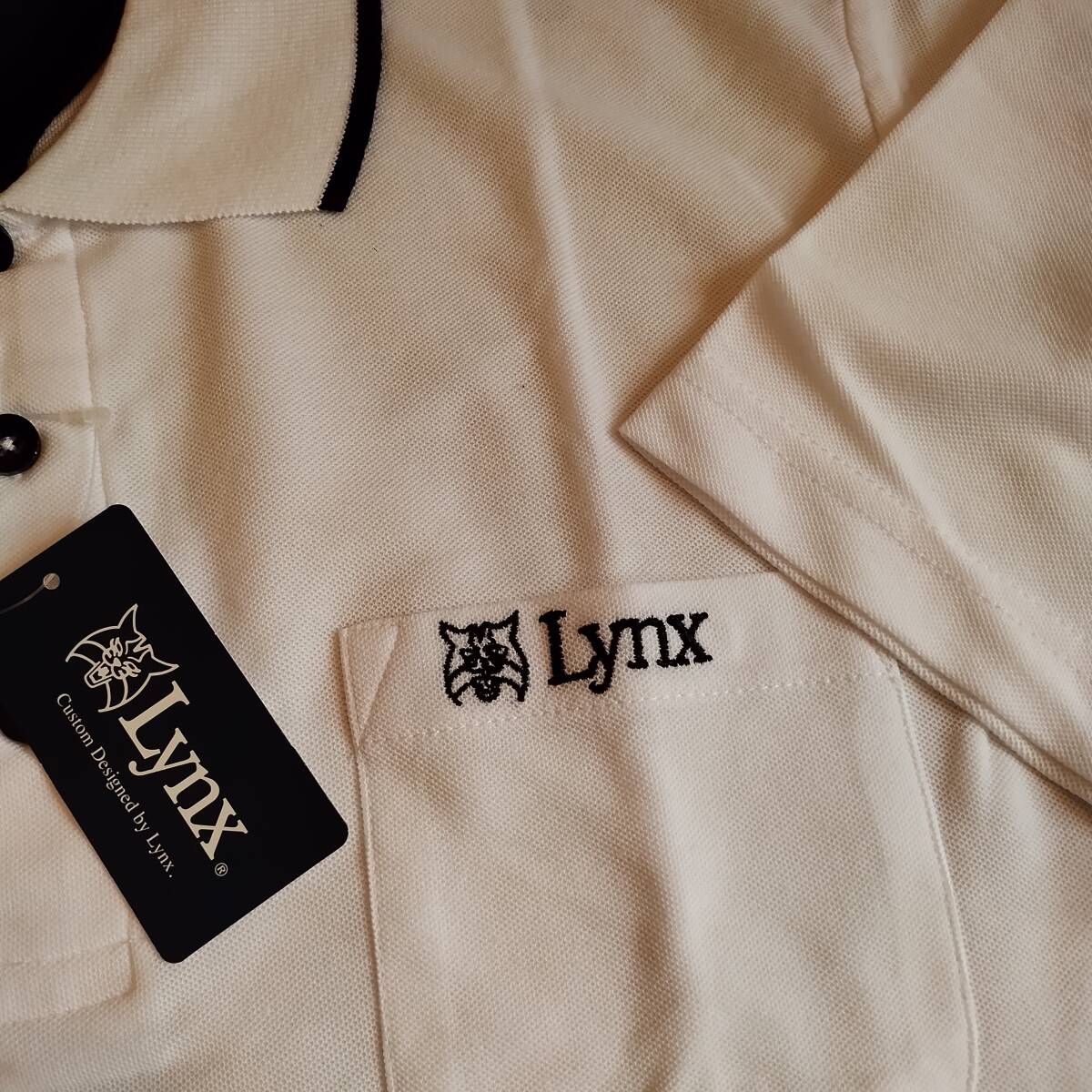 未使用品　リンクス　Lynx　半袖シャツ　サイズＭ　やや光沢 ホワイト　ストレッチ　柔らかい　細かいメッシュ風 ドライ速乾薄手生地