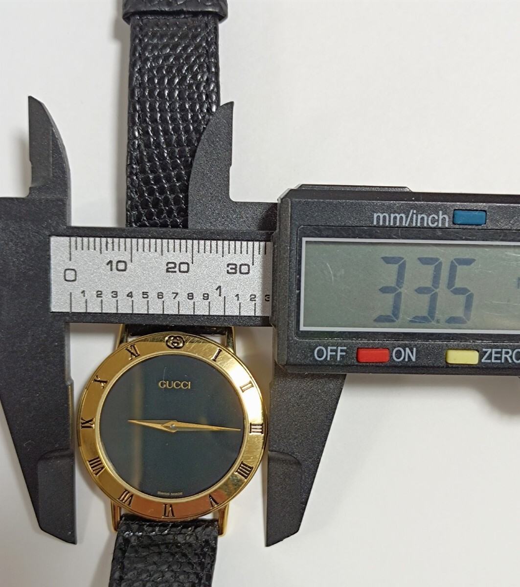 稼 働品 GUCCI 3000.2.M メンズ腕時計 黒色文字盤 新品電池 オリジナル革ベルト、尾錠 _画像9