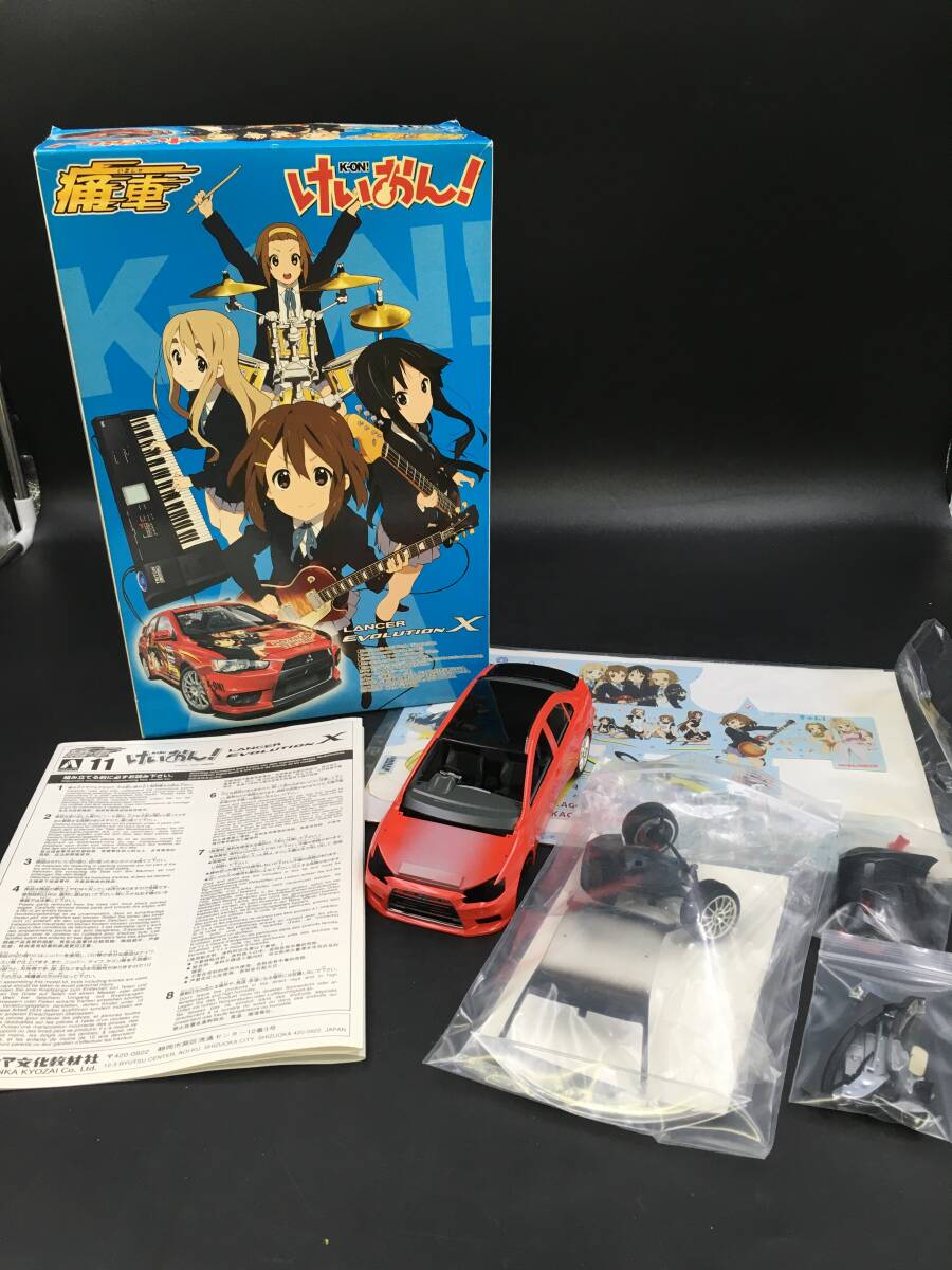 0514-102☆組立途中 けいおん！ 痛車 ランサーエボリューション X 1/24 箱有り 説明書有り プラモデル 当時物 アオシマ_画像1