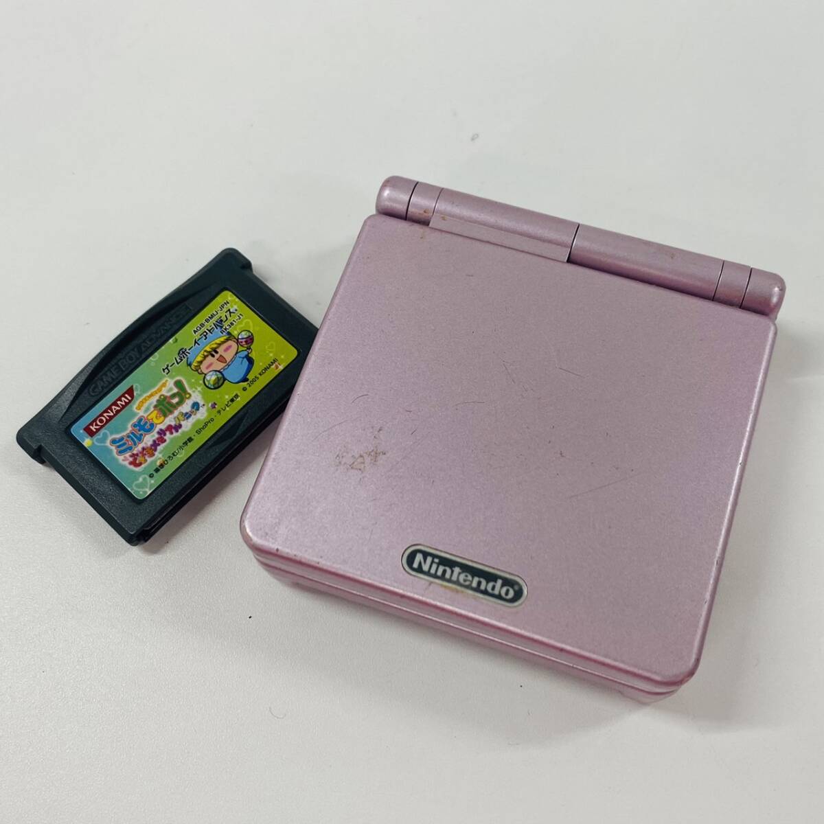 L248-Z15-254 ◎ Nintendo 任天堂 GAME BOY ADVANCE SP ゲームボーイアドバンス AGS-001 本体 通電確認済み カセット付 ゲーム機 ピンク ②_画像1