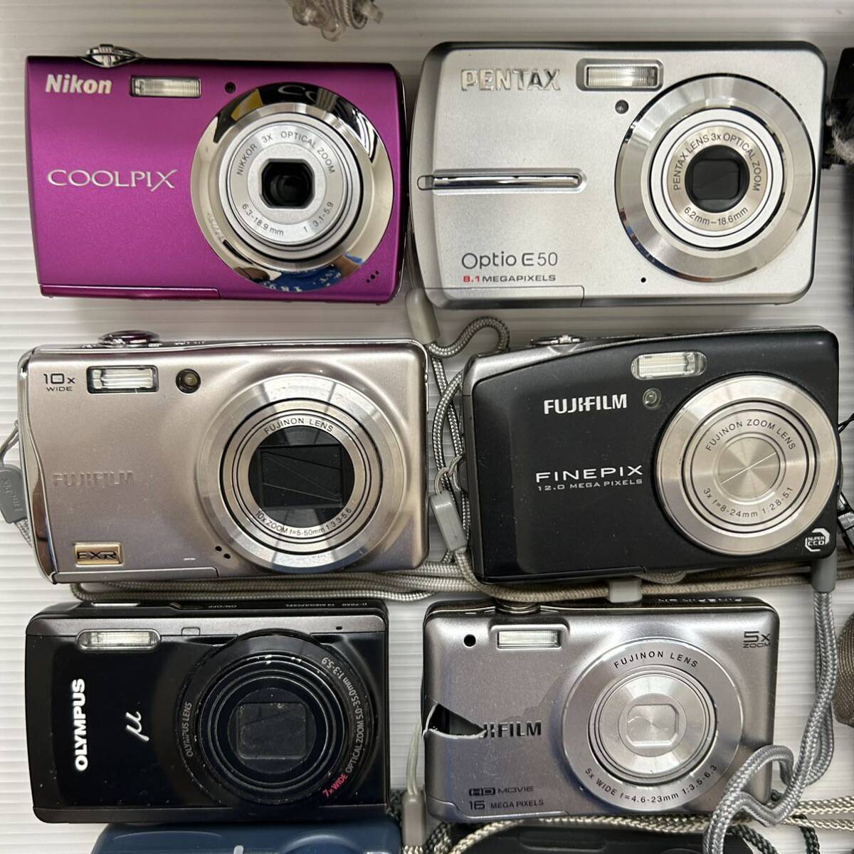 1円~デジカメまとめ OLYMPUS FUJIFILM FINEPIX PENTAX Optio Nikon Coolpix Canon IXY Panasonic LUMIX (ジャンク品 動作未確認 GK70102)の画像3