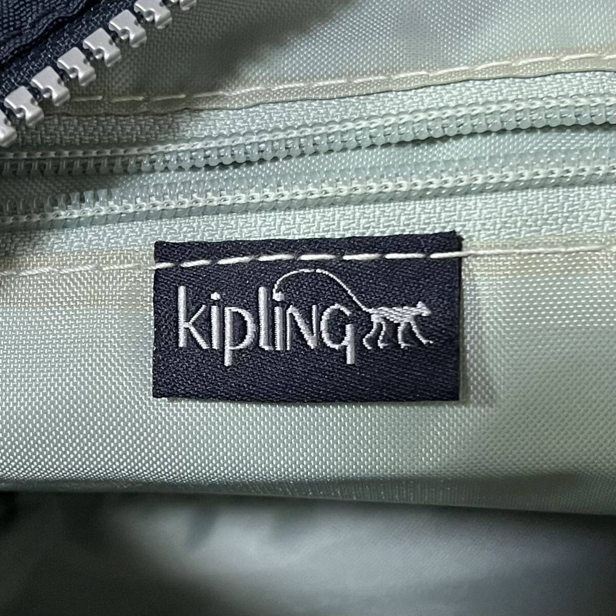 SI■ KIPLING キプリング ショルダーバッグ 紺色 ネイビー ストラップ付き ポケット多数 シンプル 無地 斜めがけ レディース 女性_画像7