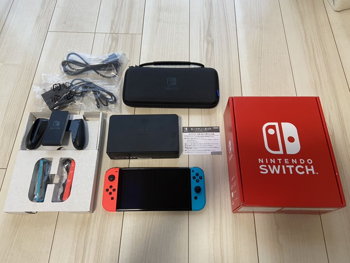 新品同様　限定赤箱　Nintendo Switch（有機ELモデル） Joy-Con ネオンブルー　ネオンレッド　スリムハードポーチ付き_画像1