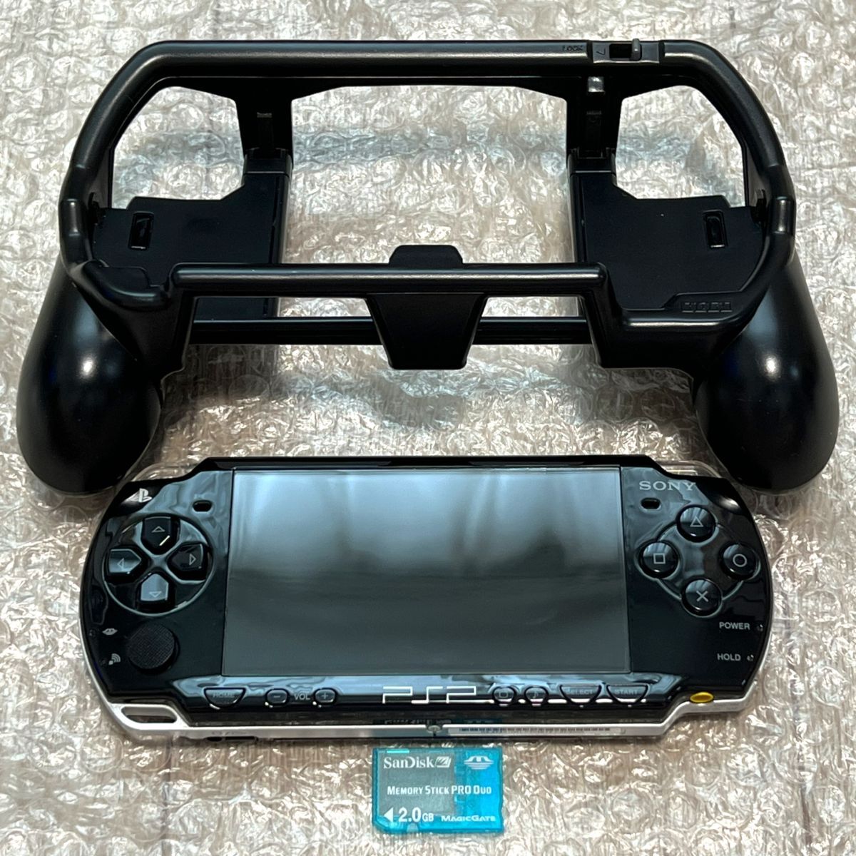 〈状態良好・動作確認済み〉PSP-2000 本体 ピアノブラック＋グリップアタッチメントポータブル PlayStation Portable 薄型_画像1