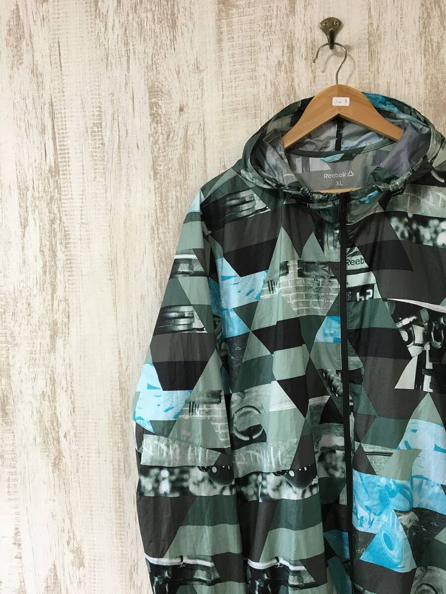 129*[ total pattern f-ti- jacket ]Reebok Reebok multicolor Wind Parker XL