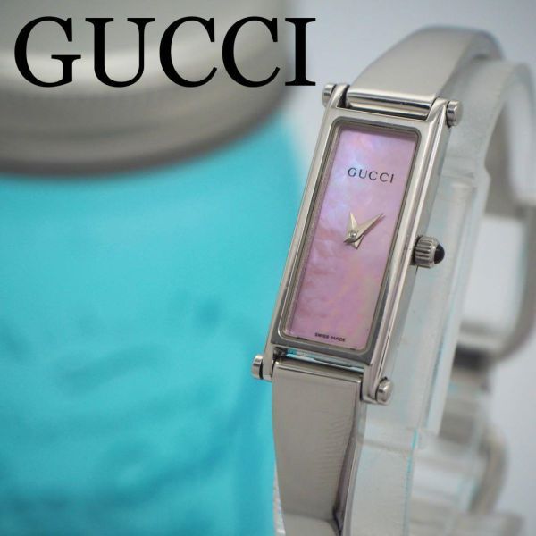 81 【美品】 GUCCI グッチ レディース腕時計 ピンク シェル バングル_画像1