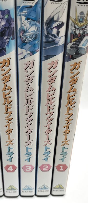 ②③巻ジャケットわずかな色褪せ、カードなし、⑦巻ディスクにわずかなリング割れ有♪　ガンダムビルドファイターズトライ 全9巻Ｓ　DVD_画像2