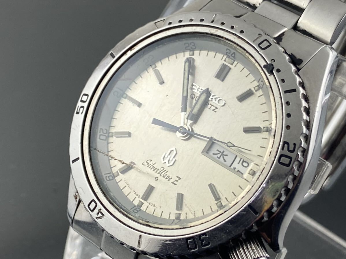 [M002]1 иен ~* мужские наручные часы Seiko SEIKO кварц серебряный wave Z SILVER WAVE Z 7546-605A рабочий товар 