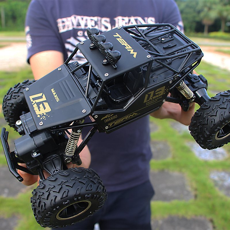 4WD ラジコンカー オフロード RCカー ラジコン 四輪駆動 操作時間25分 リモコンカー 防振性 走破性抜群 子供プレゼントに最適_画像1