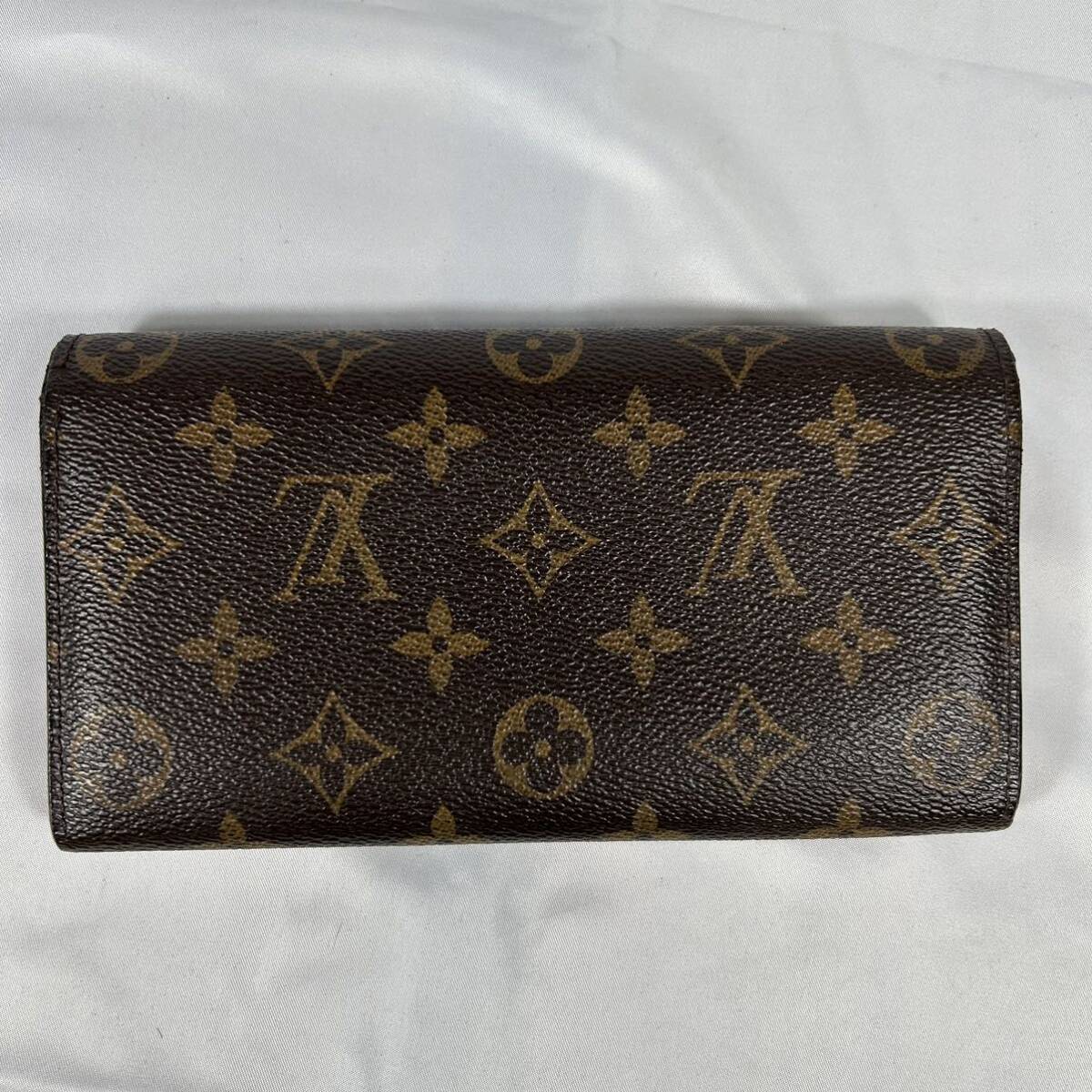 LOUIS VUITTON ルイヴィトン　ポルトフォイユサラ　長財布 フラップ モノグラム　PVC ブラウン　折り財布　ホック　_画像2