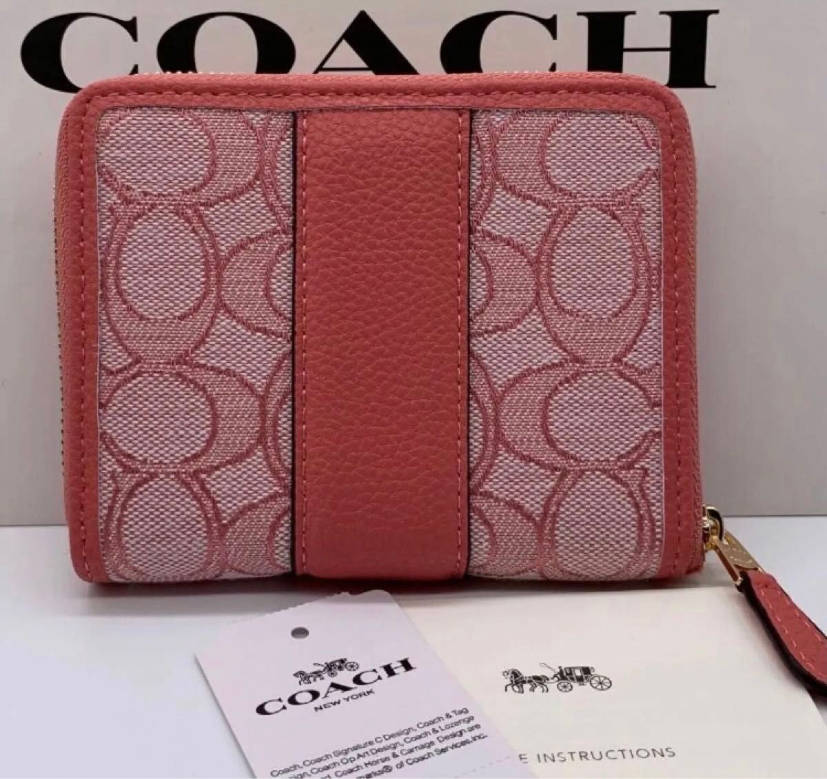 訳あり品　COACH 二つ折り財布　ピンク　シグネチャー　アウトレット品　