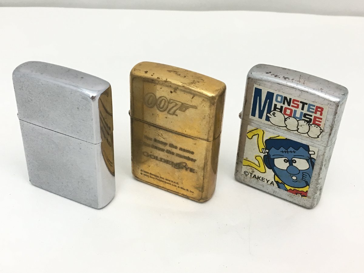 ■Zippo MONSTER HOUSE / 007 GOLDENEYE 他 オイルライター 3点 まとめ 火花あり/現状渡し 中古【UW050122】の画像1