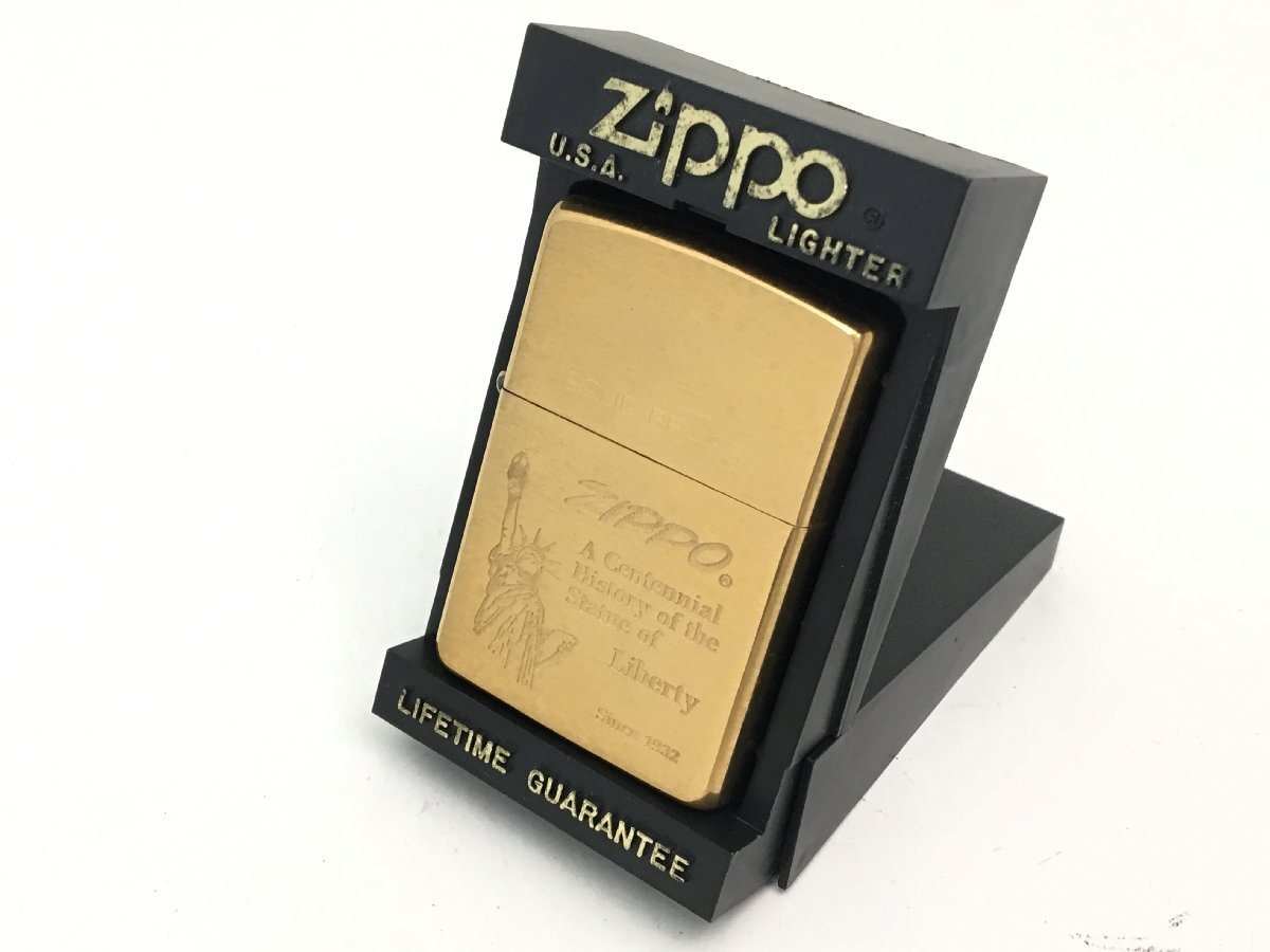 ■Zippo SOLID BRASS オイルライター 1995年製 ゴールド 箱付き 火花あり 中古【MA050021】_画像1