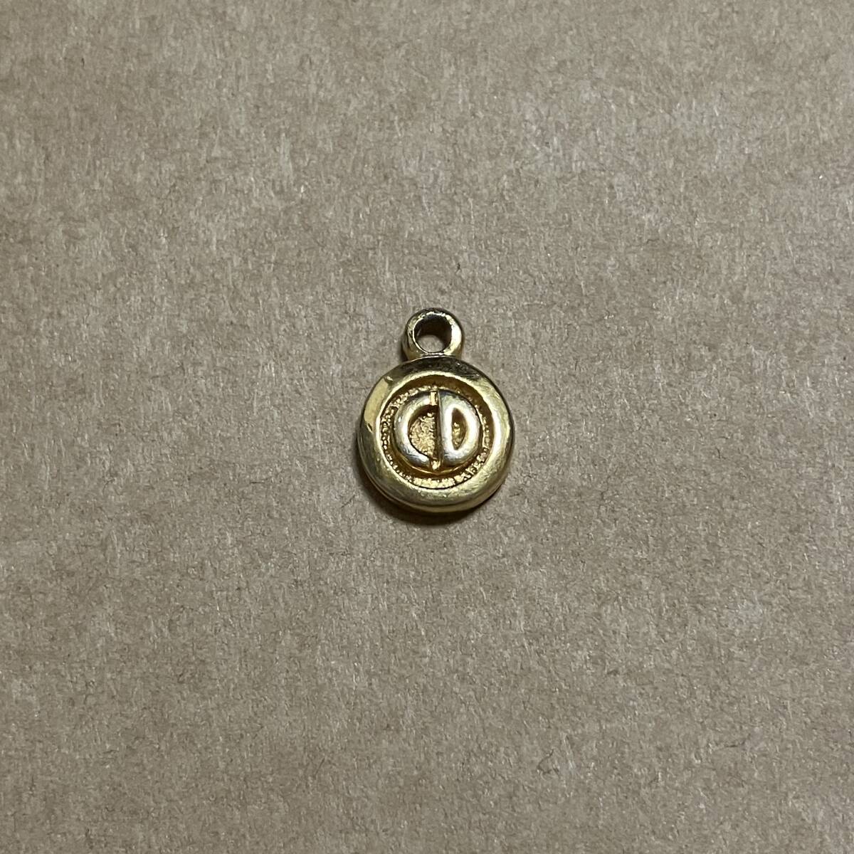 used Christian Dior Dior pendant top approximately 14mm gold color 