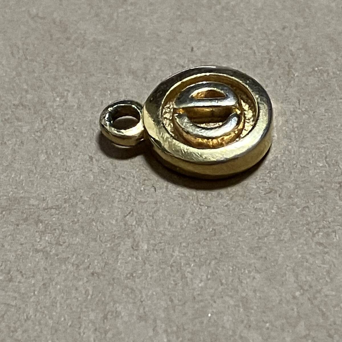 used Christian Dior Dior pendant top approximately 14mm gold color 