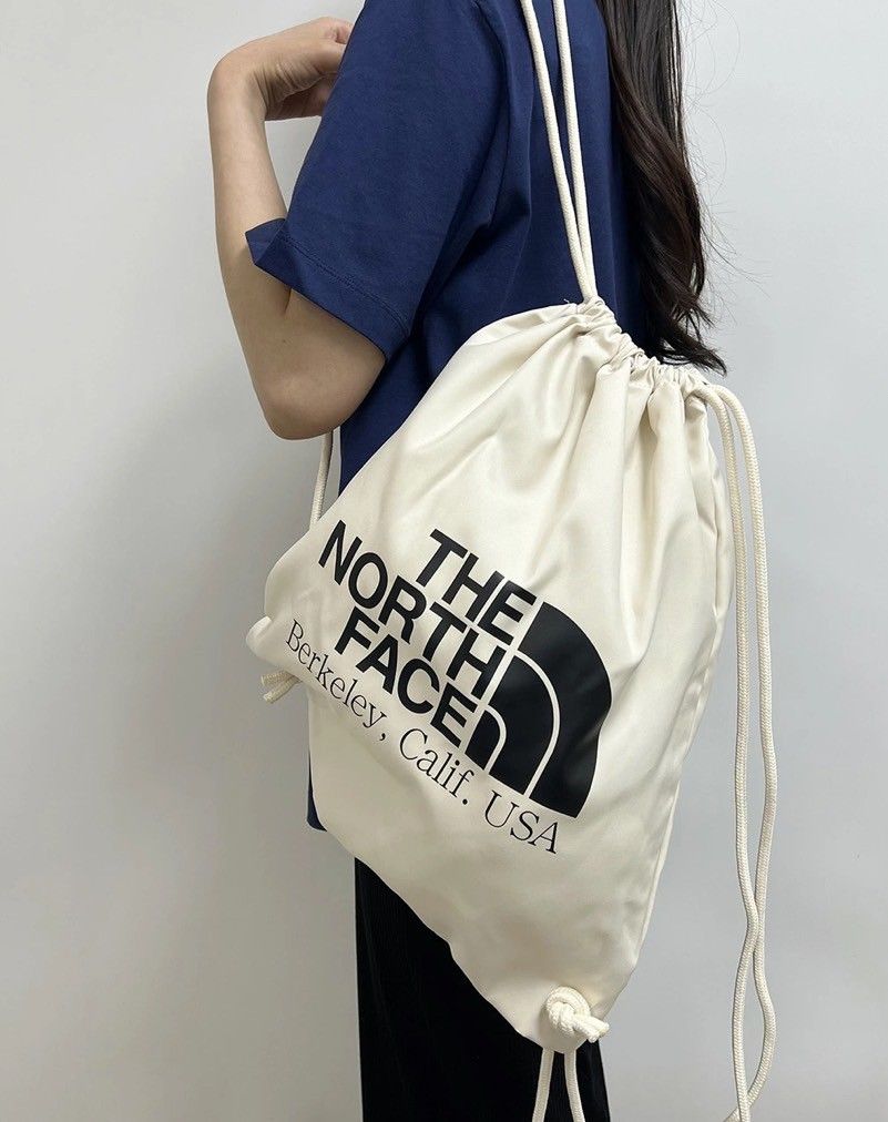 韓国ノースフェイスホワイトレーベルBIG LOGO STRING BAG2wayナップサックリュックトートバッグショルダーバッグ黒