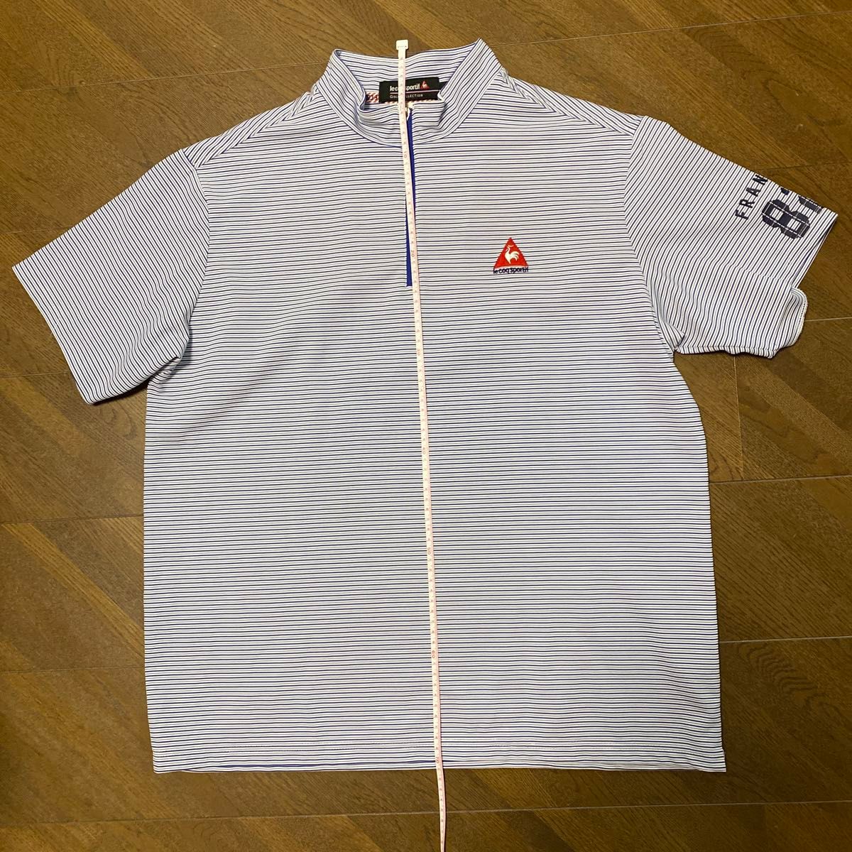 【le coq sportif】ルコックスポルティフ　ハーフジップトップス　白×紺ボーダー　L ゴルフウェア　GOLF（袖口不良）