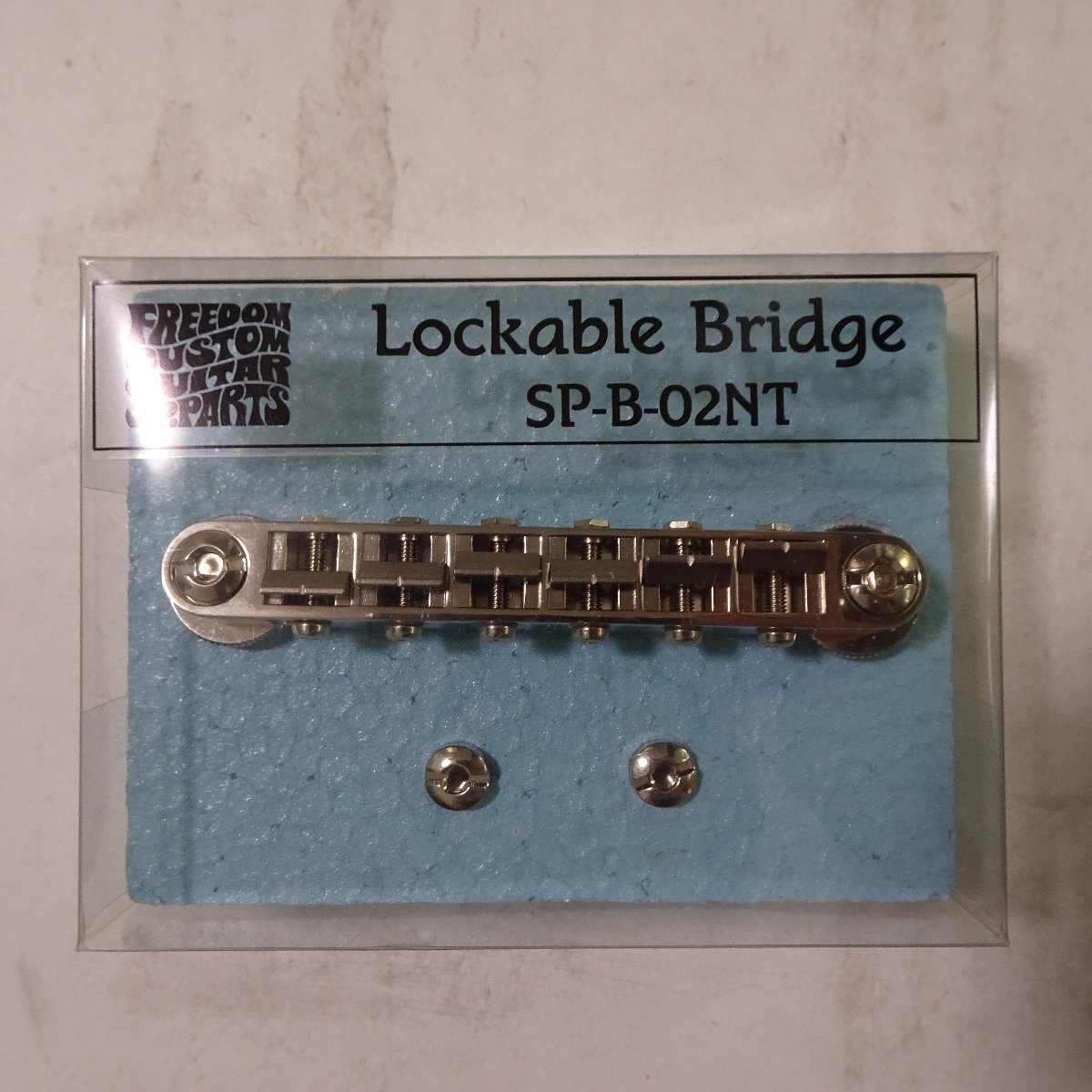 Q10625【発送可!】Freedom Custom Guitar SP-B-02NT Lockable Bridge Titanium Saddle Nickelの画像1