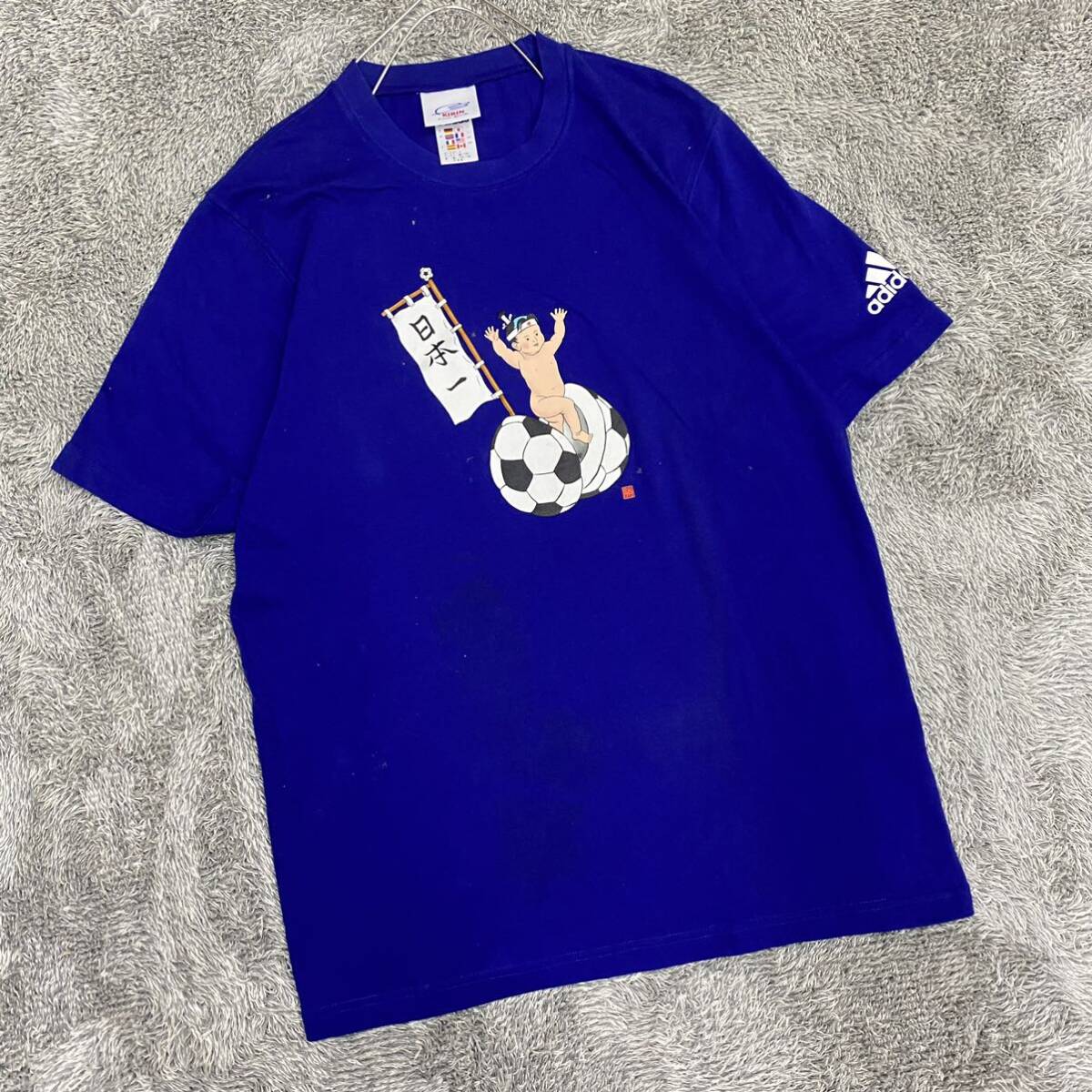 adidas アディダス Tシャツ 半袖カットソー KIRIN 桃太郎 サイズL ブルー 青 メンズ トップス 最落なし （X19）_画像1