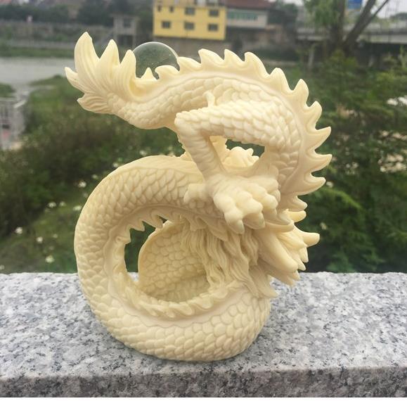 [ finest quality. tree carving ]. carving . dragon .., record dragon ornament 